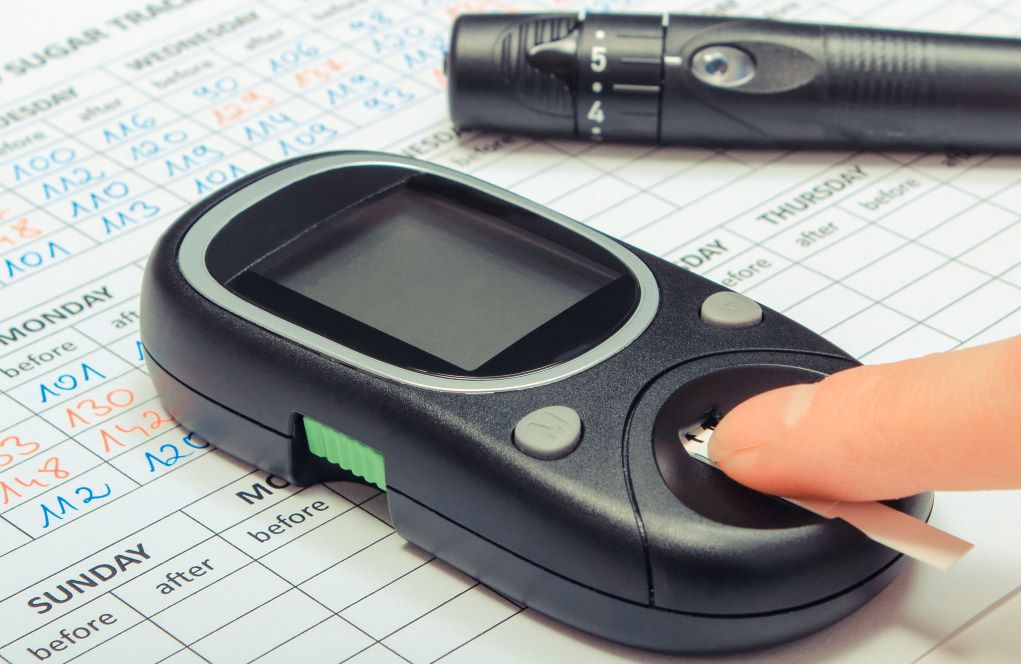 blood glucose levels meter and measuring sugar level diabetes 