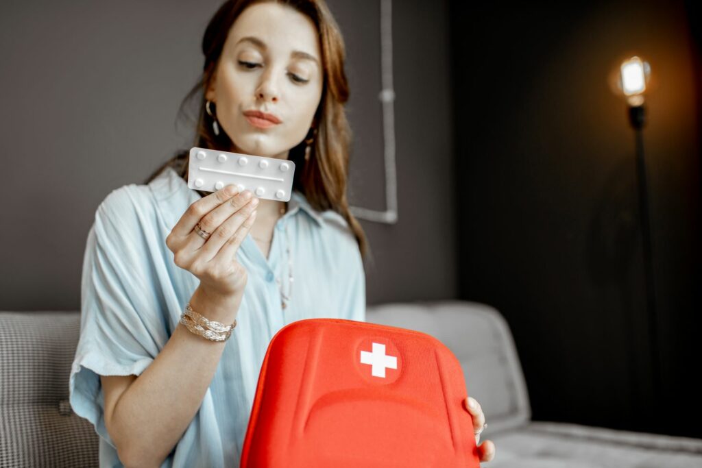 Reviewing first aid kit content for expiry dates