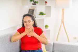 woman in choking emergency