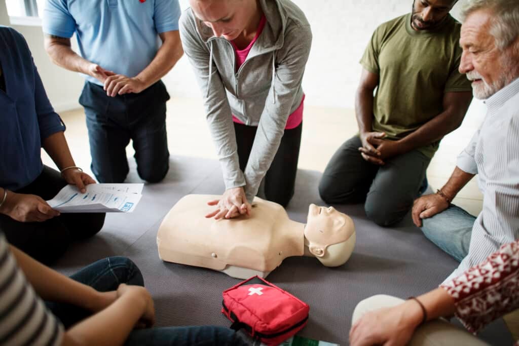 2026 National first aid course - Group of diverse people in cpr training class