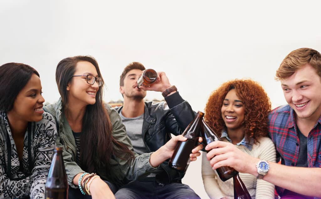 Young people drinking alcohol at a party