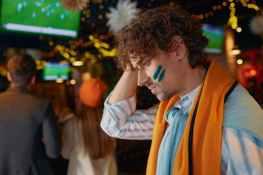 Social anxiety - Frustrated sad man at a party