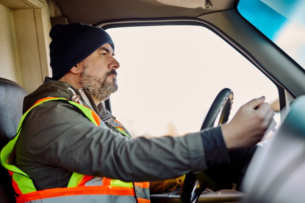 tradesman driving to a job