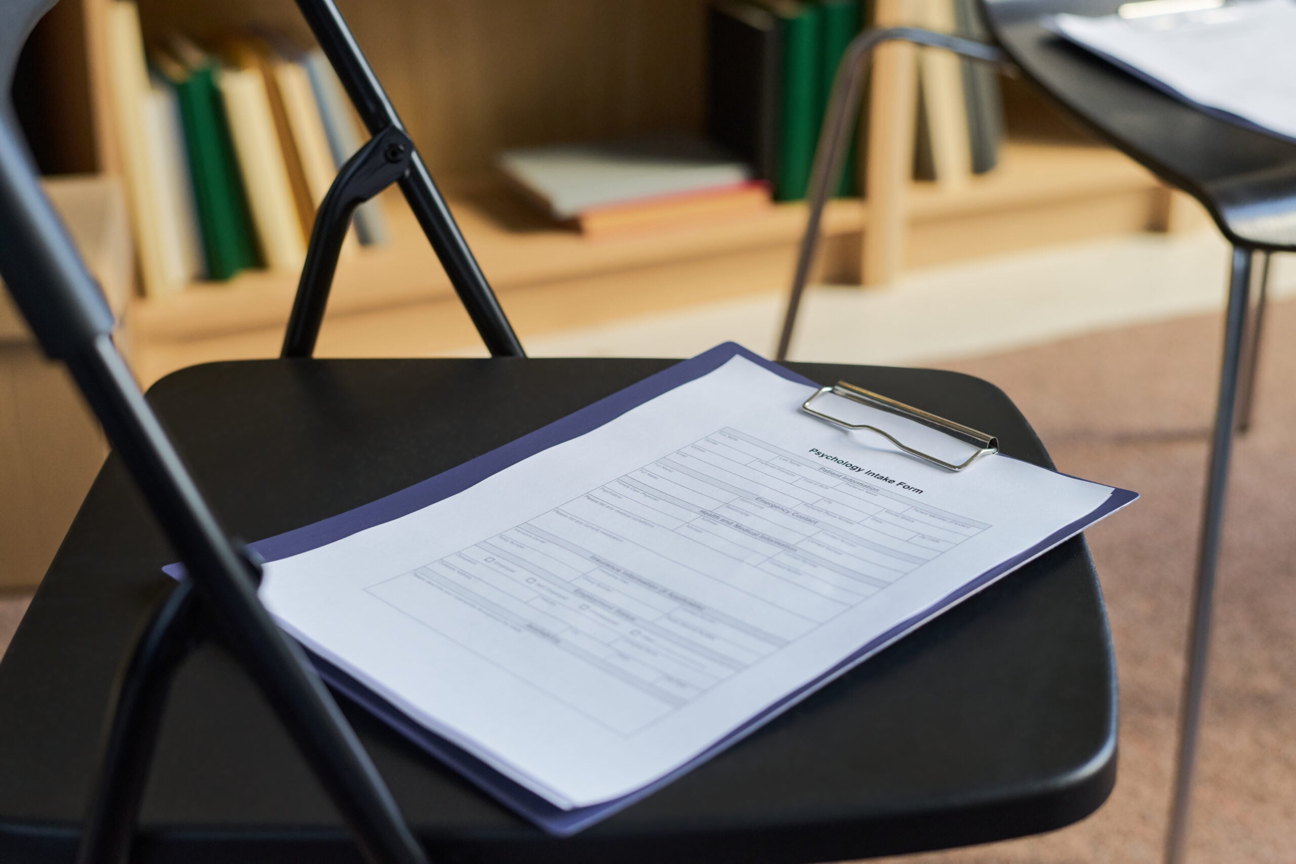 White Card test - test papers on empty chairs